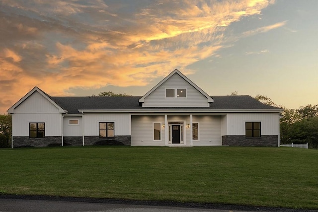 68 Richard Cir, Seekonk, MA 02771 - view of front of home featuring stone siding, a front yard, and roof with shingles