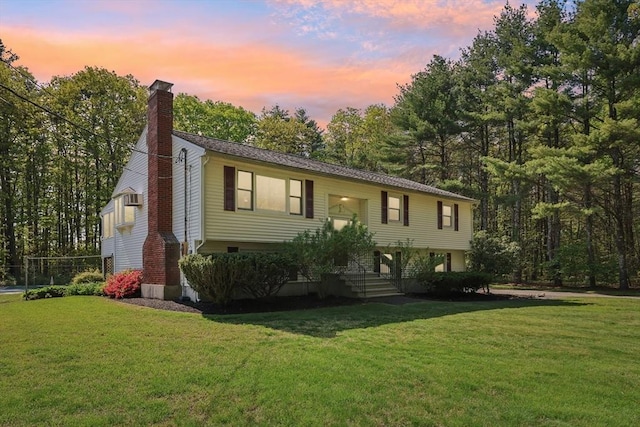486 E Broadway, Haverhill, MA 01830 - bi-level home with a chimney and a yard