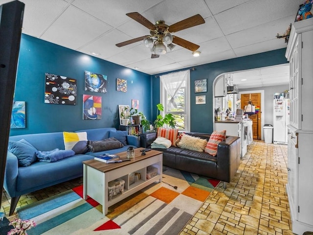 19 Tufts St, Somerville, MA 02145 - living room with a ceiling fan and a paneled ceiling