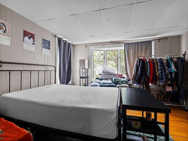 19 Tufts St, Somerville, MA 02145 - bedroom featuring a paneled ceiling and wood finished floors