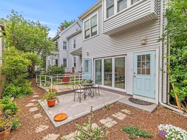 19 Tufts St, Somerville, MA 02145 - rear view of property with a patio area