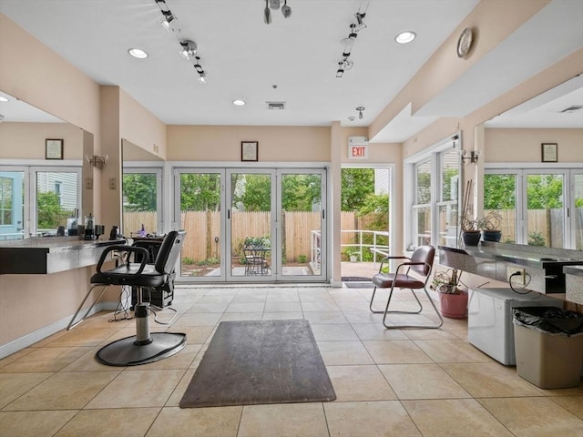 19 Tufts St, Somerville, MA 02145 - sunroom / solarium featuring french doors, rail lighting, and healthy amount of natural light