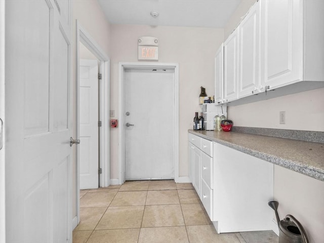 19 Tufts St, Somerville, MA 02145 - washroom with light tile patterned flooring