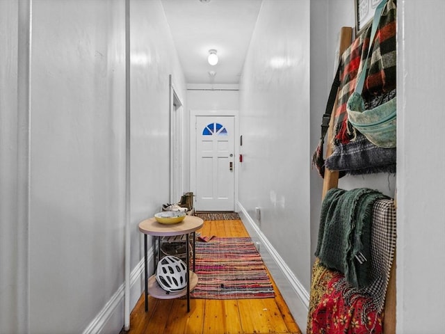 19 Tufts St, Somerville, MA 02145 - entryway featuring wood finished floors and baseboards