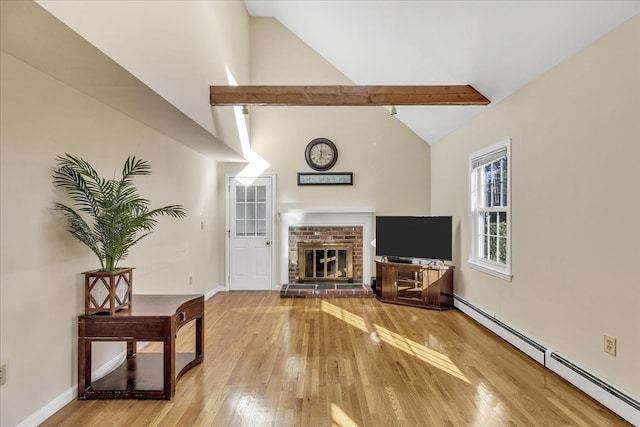 living room with baseboard heating, beamed ceiling, high vaulted ceiling, a fireplace, and hardwood / wood-style flooring