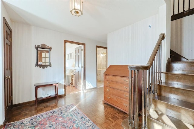 stairway with parquet floors