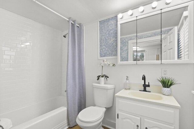63 Adams St, Bourne, MA 02532 - bathroom featuring vanity, toilet, and shower / bath combination with curtain