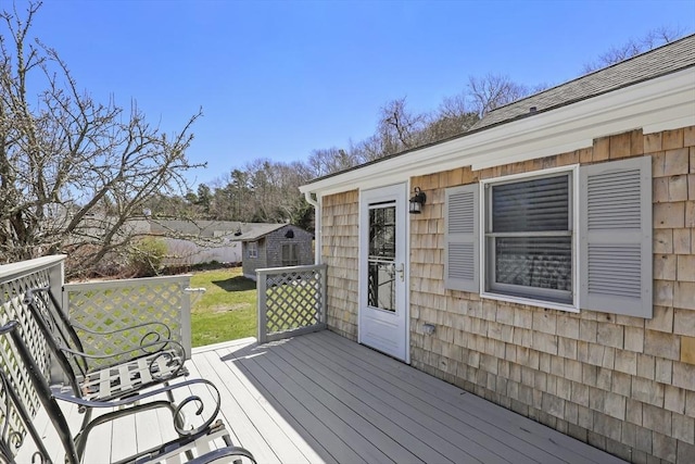 63 Adams St, Bourne, MA 02532 - deck with an outbuilding and a shed