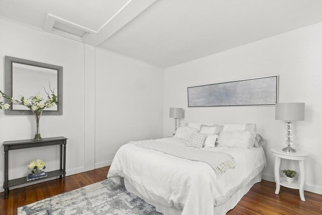 63 Adams St, Bourne, MA 02532 - bedroom featuring baseboards, attic access, and wood finished floors