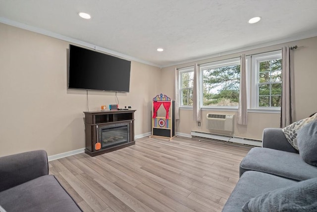 living room featuring a wall mounted air conditioner, light wood-type flooring, baseboards, and baseboard heating