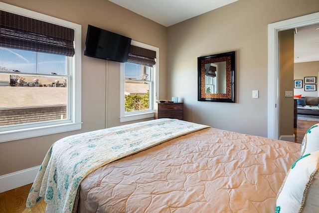 bedroom featuring hardwood / wood-style flooring