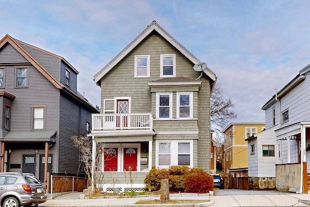 view of front of property with a balcony