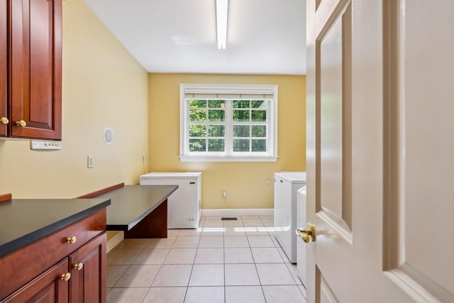20 Hillery Rd, Leominster, MA 01453 - laundry area featuring independent washer and dryer, cabinet space, light tile patterned flooring, and baseboards