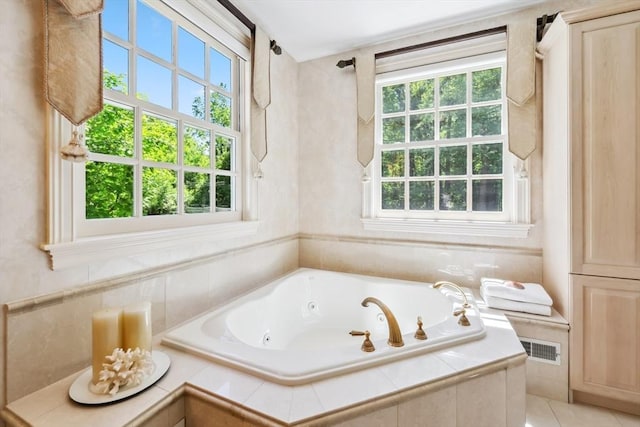 20 Hillery Rd, Leominster, MA 01453 - bathroom with a tub with jets and tile patterned flooring