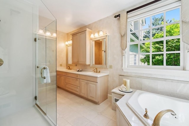 20 Hillery Rd, Leominster, MA 01453 - full bathroom featuring double vanity, a whirlpool tub, a shower stall, and tile patterned floors