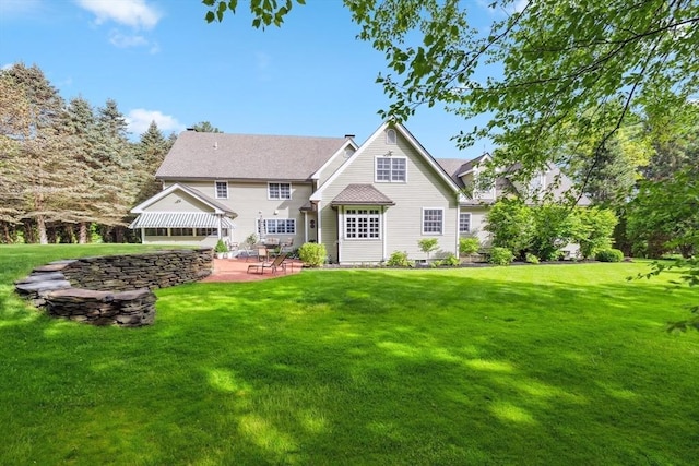 20 Hillery Rd, Leominster, MA 01453 - back of house with a patio and a lawn