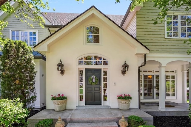 20 Hillery Rd, Leominster, MA 01453 - property entrance featuring stucco siding and covered porch