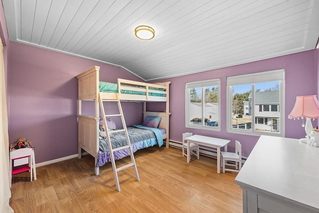 bedroom with lofted ceiling, light wood-style flooring, baseboards, and wooden ceiling