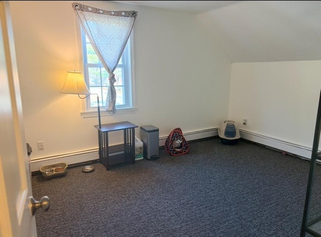 interior space with a baseboard radiator, lofted ceiling, and dark colored carpet