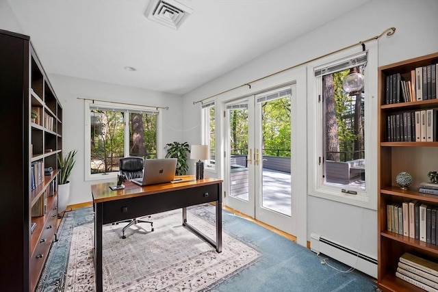 office space with a baseboard heating unit and french doors