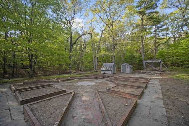 view of patio / terrace with a storage shed