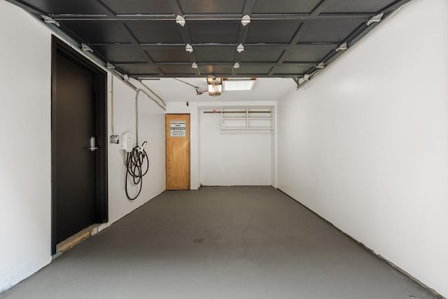 hallway featuring concrete flooring