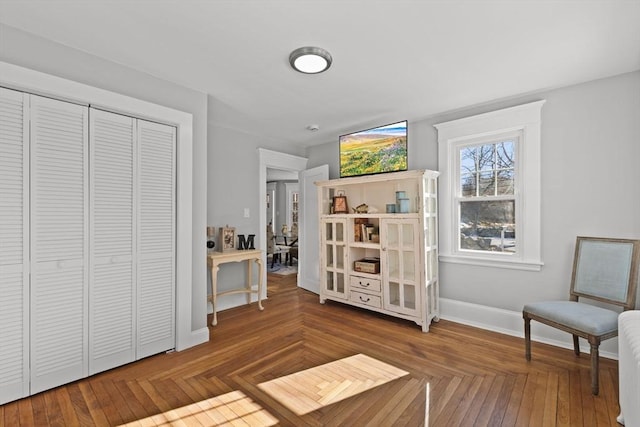 sitting room with parquet flooring