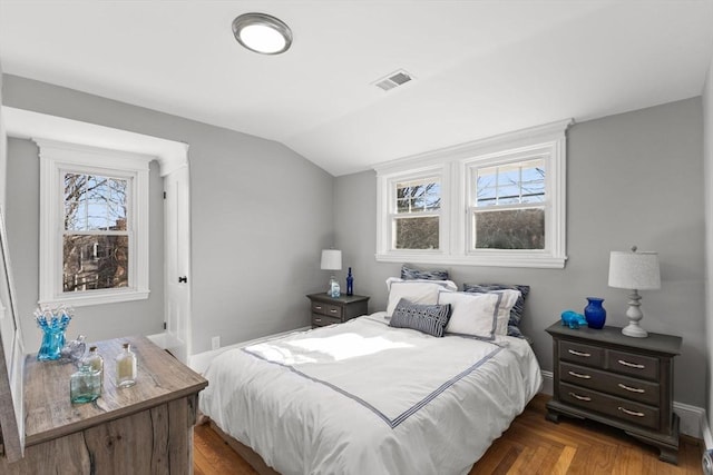 bedroom with vaulted ceiling