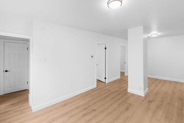 basement featuring light hardwood / wood-style flooring