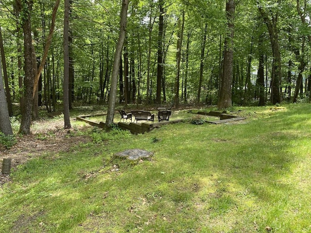 8 Tall Tree Way, Georgetown, MA 01833 - view of yard featuring a wooded view