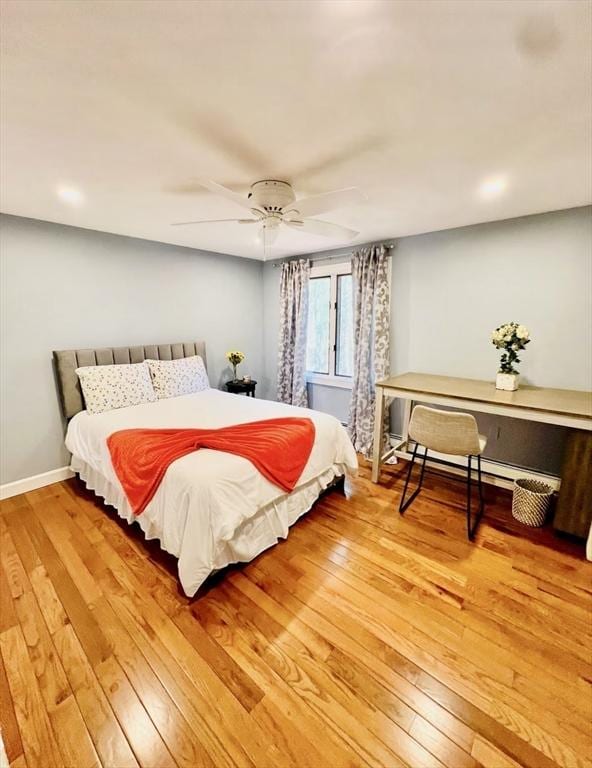 8 Tall Tree Way, Georgetown, MA 01833 - bedroom featuring light wood finished floors, a baseboard heating unit, and a ceiling fan