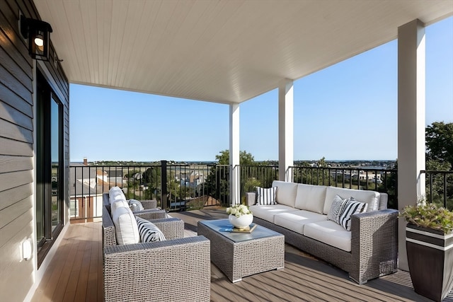 wooden deck featuring outdoor lounge area