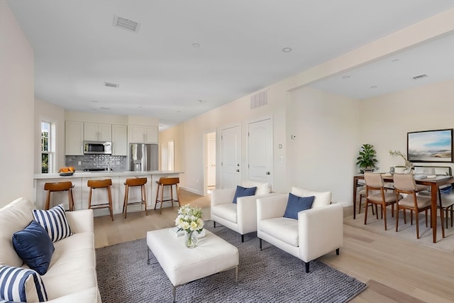 living room featuring light hardwood / wood-style flooring