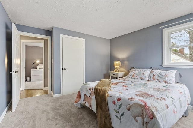 30 Millham St, Marlborough, MA 01752 - carpeted bedroom featuring a textured ceiling and baseboards