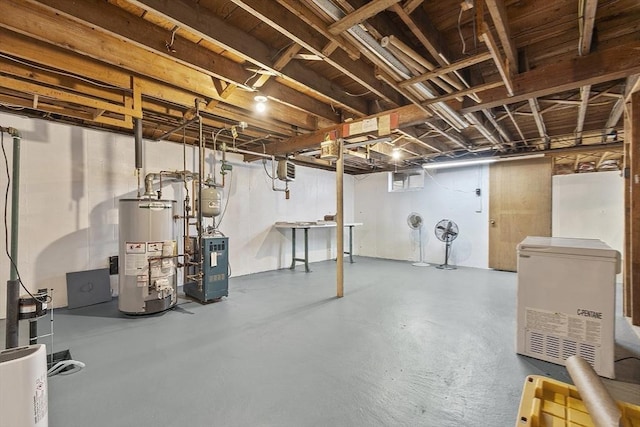 30 Millham St, Marlborough, MA 01752 - unfinished below grade area with gas water heater and a heating unit