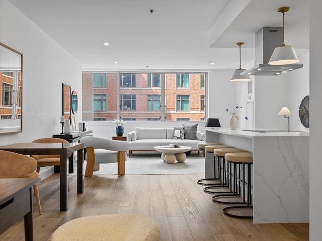 interior space with hardwood / wood-style floors and recessed lighting