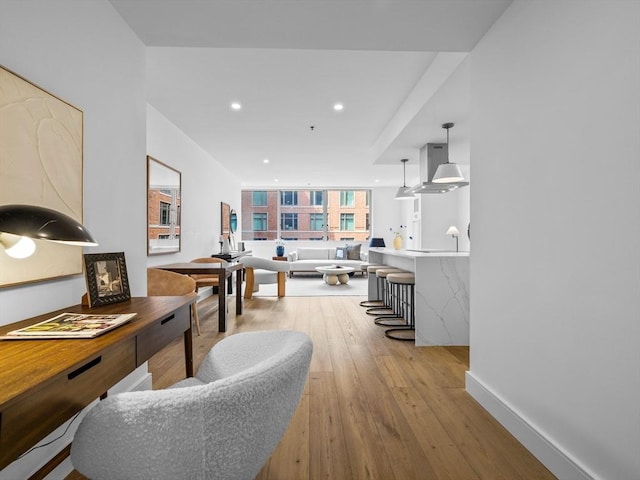 interior space featuring hardwood / wood-style floors and recessed lighting