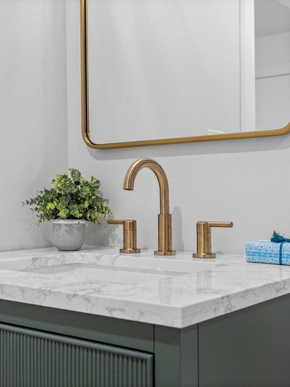 room details featuring vanity and dishwasher