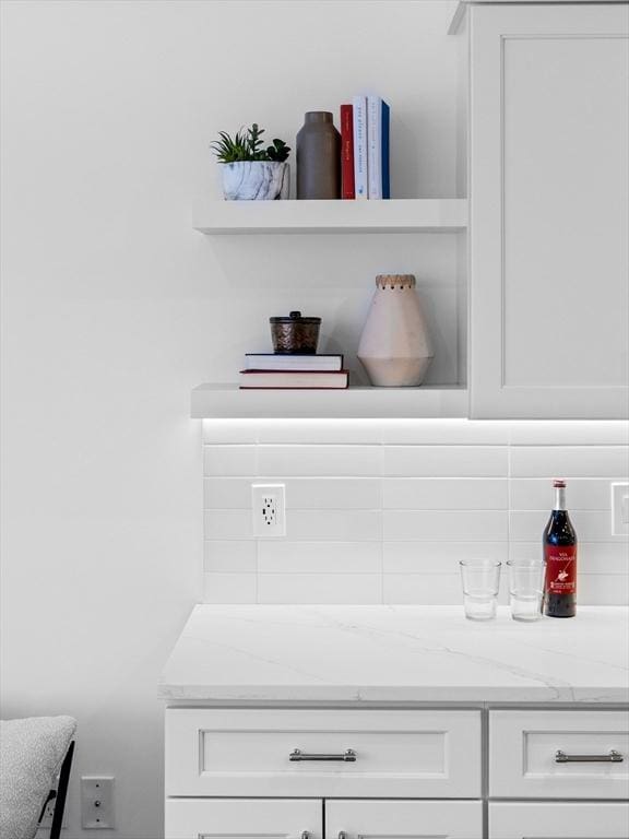 interior details featuring decorative backsplash