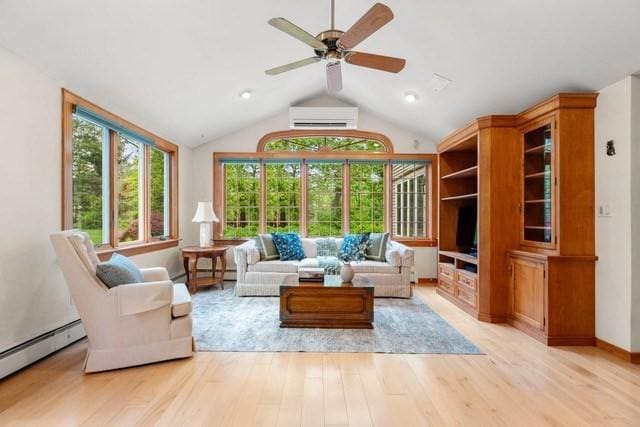 75 Haynes Rd, Sudbury, MA 01776 - living room with an AC wall unit, baseboard heating, light wood-style floors, a ceiling fan, and vaulted ceiling