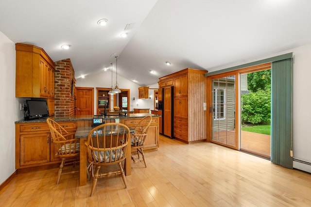 75 Haynes Rd, Sudbury, MA 01776 - dining area featuring lofted ceiling and light wood finished floors
