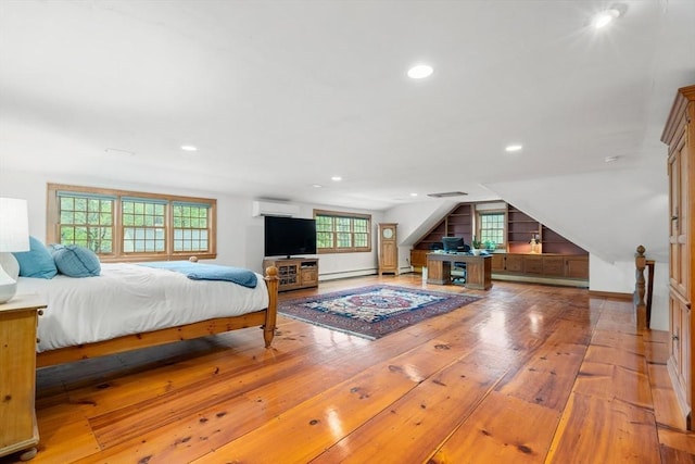 75 Haynes Rd, Sudbury, MA 01776 - bedroom featuring vaulted ceiling, hardwood / wood-style flooring, recessed lighting, baseboards, and a baseboard radiator