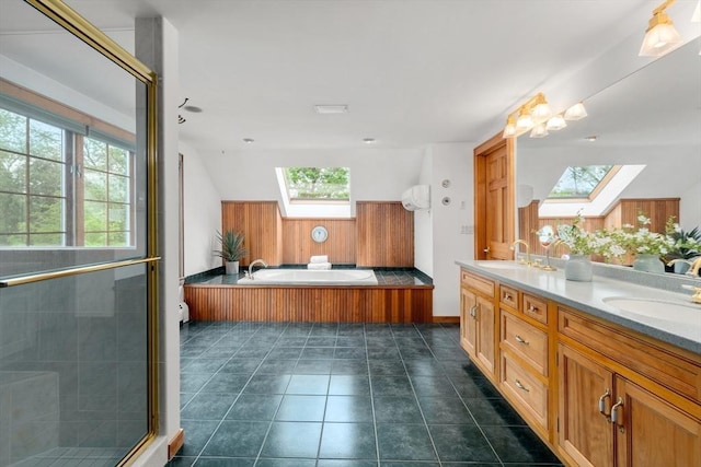 75 Haynes Rd, Sudbury, MA 01776 - full bath with a skylight, double vanity, a bath, and a stall shower