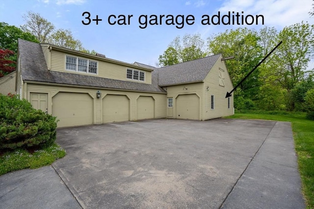 75 Haynes Rd, Sudbury, MA 01776 - view of front of property with a garage, roof with shingles, and driveway