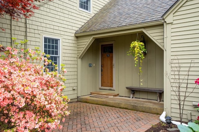 75 Haynes Rd, Sudbury, MA 01776 - doorway to property featuring roof with shingles