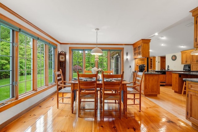 75 Haynes Rd, Sudbury, MA 01776 - dining room featuring light wood-type flooring, plenty of natural light, ornamental molding, baseboards, and recessed lighting