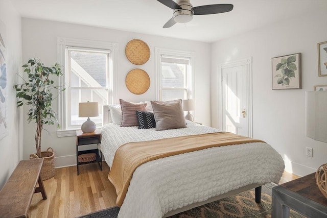 22 Robinson Unit 3, Somerville, MA 02145 - bedroom with wood finished floors and a ceiling fan