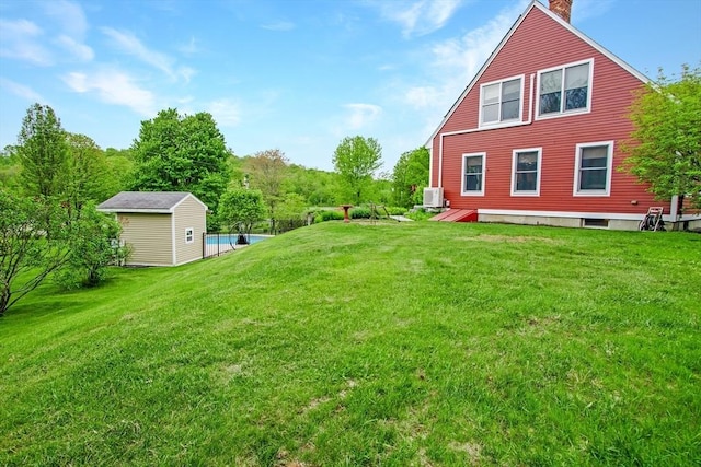 144 Worcester Rd, New Braintree, MA 01531 - view of green lawn featuring a swimming pool and an outbuilding
