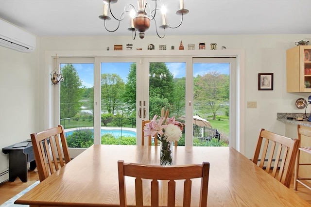 144 Worcester Rd, New Braintree, MA 01531 - dining room featuring an AC wall unit, a baseboard radiator, healthy amount of natural light, and a chandelier