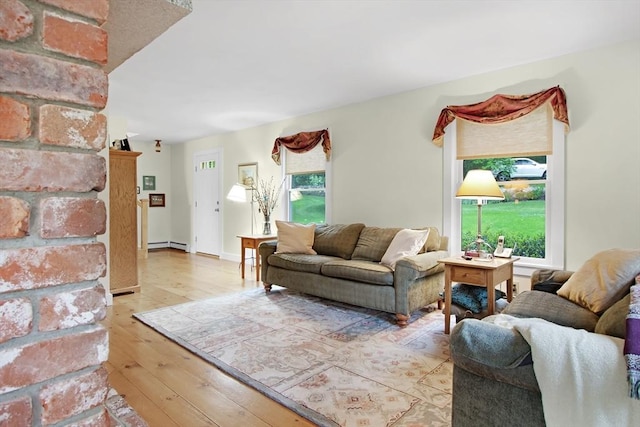 144 Worcester Rd, New Braintree, MA 01531 - living room with light wood-style floors, healthy amount of natural light, and baseboard heating